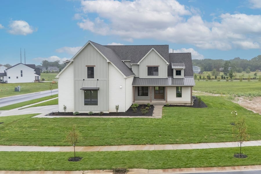 Modern farmhouse exterior aerial view