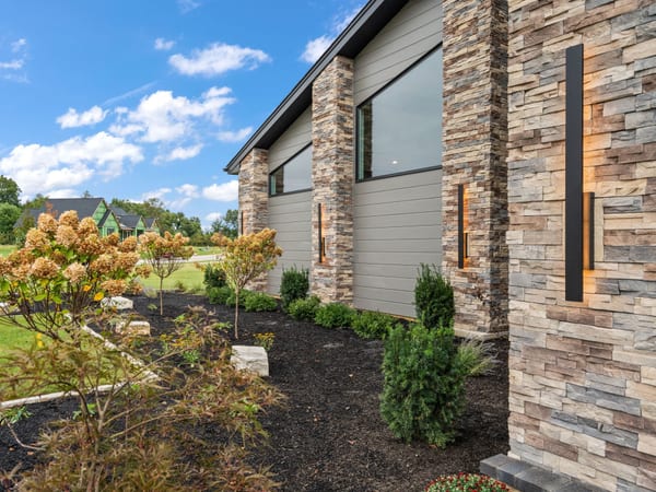 Custom home exterior at sunset